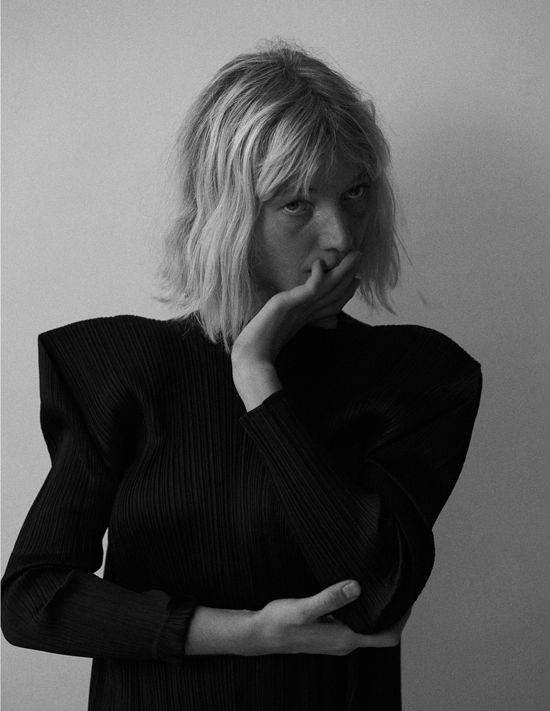 Lou Schoof by New York fashion photographer Emily Soto shot in studio on black and white film