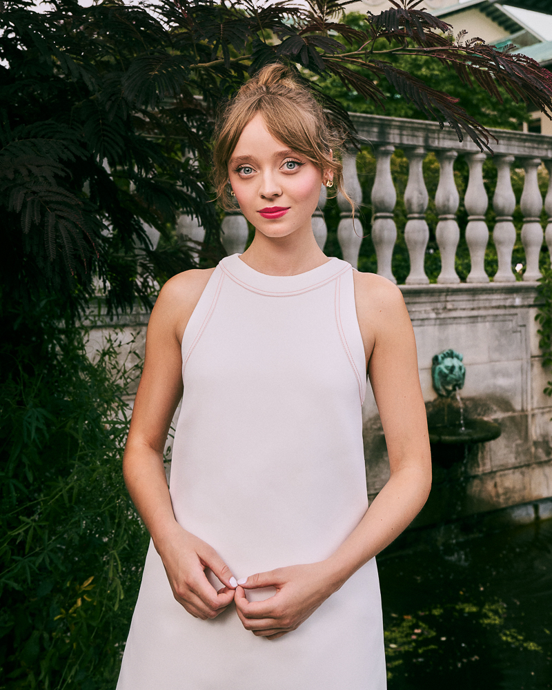 Portrait of actress Madeleine Arthur shot by fashion and celebrity photographer Emily Soto for Dior in the Brooklyn Botanic Garden in NYC